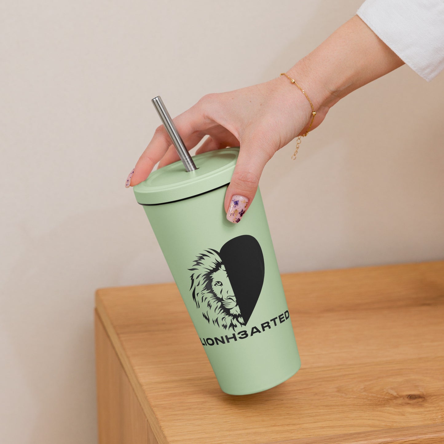 Insulated tumbler with a straw