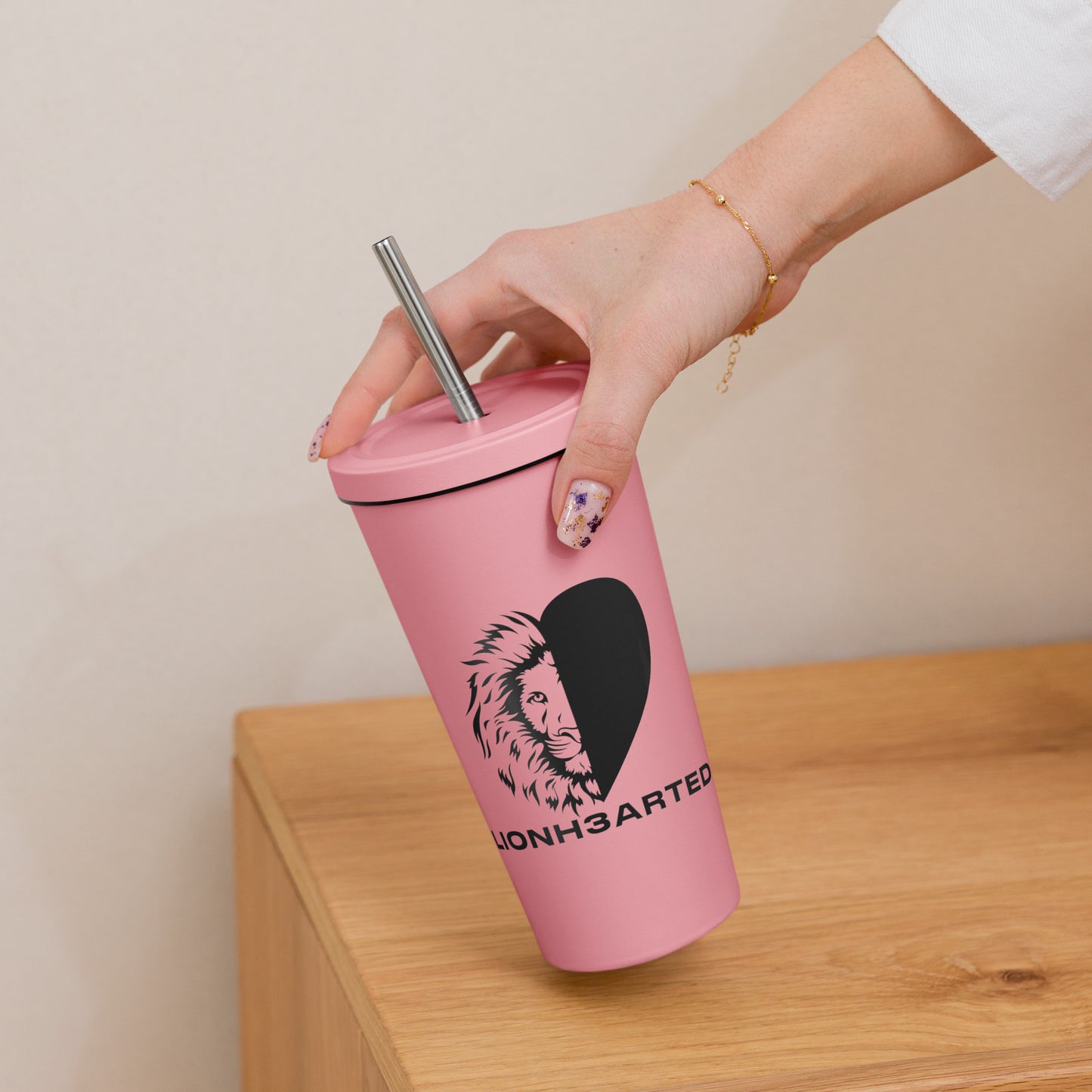 Insulated tumbler with a straw