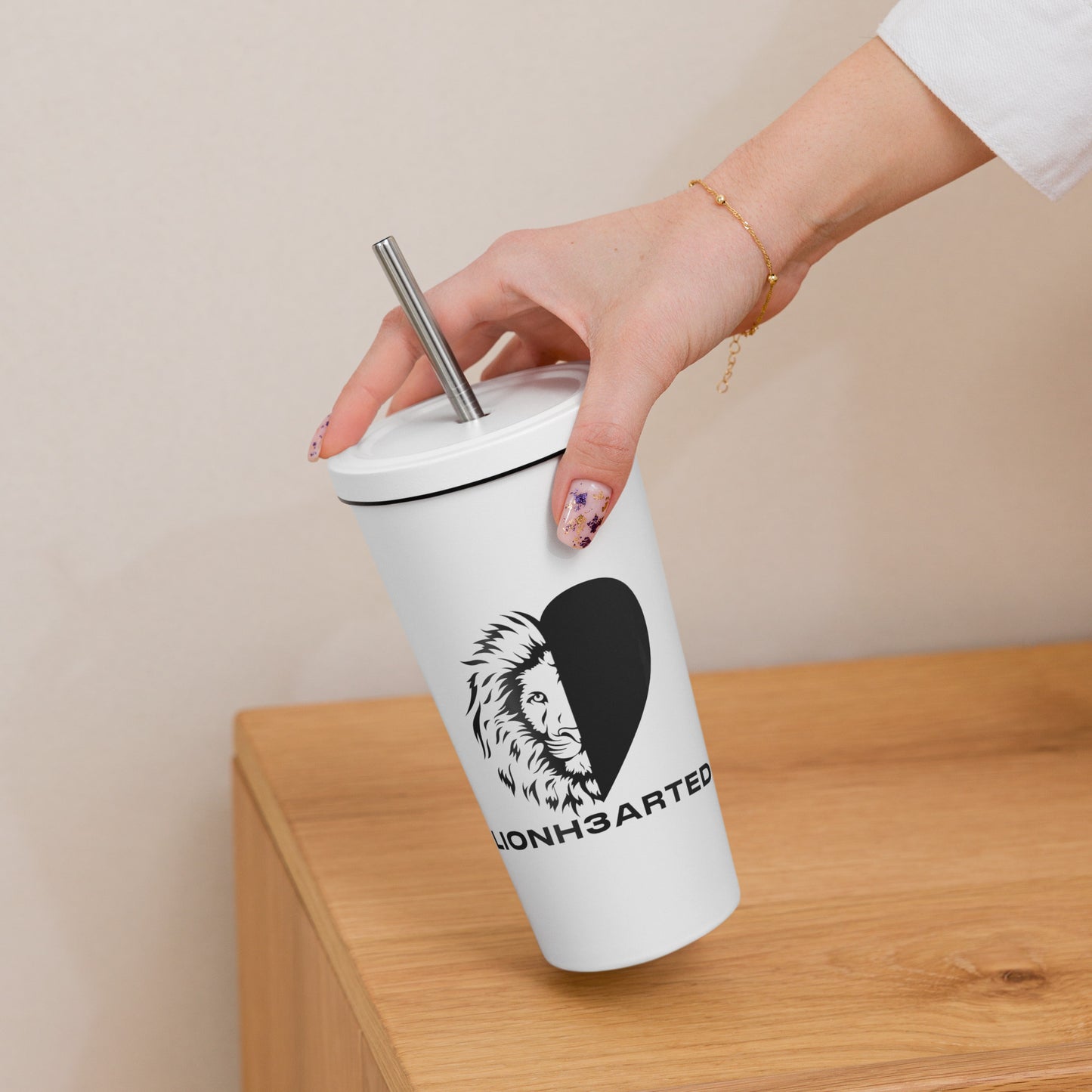 Insulated tumbler with a straw